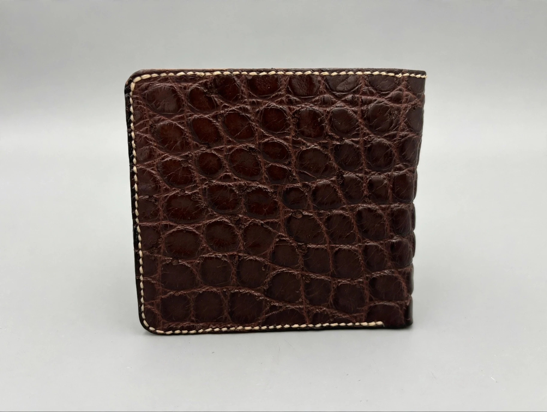 Handmade alligator bifold wallet, dark brown belly exterior