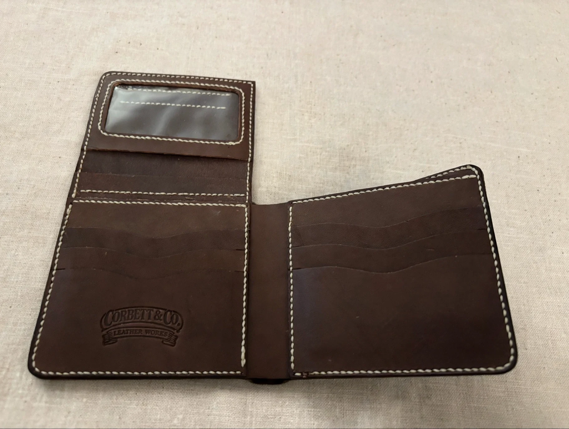 Alligator bifold wallet interior with card slots and ID window